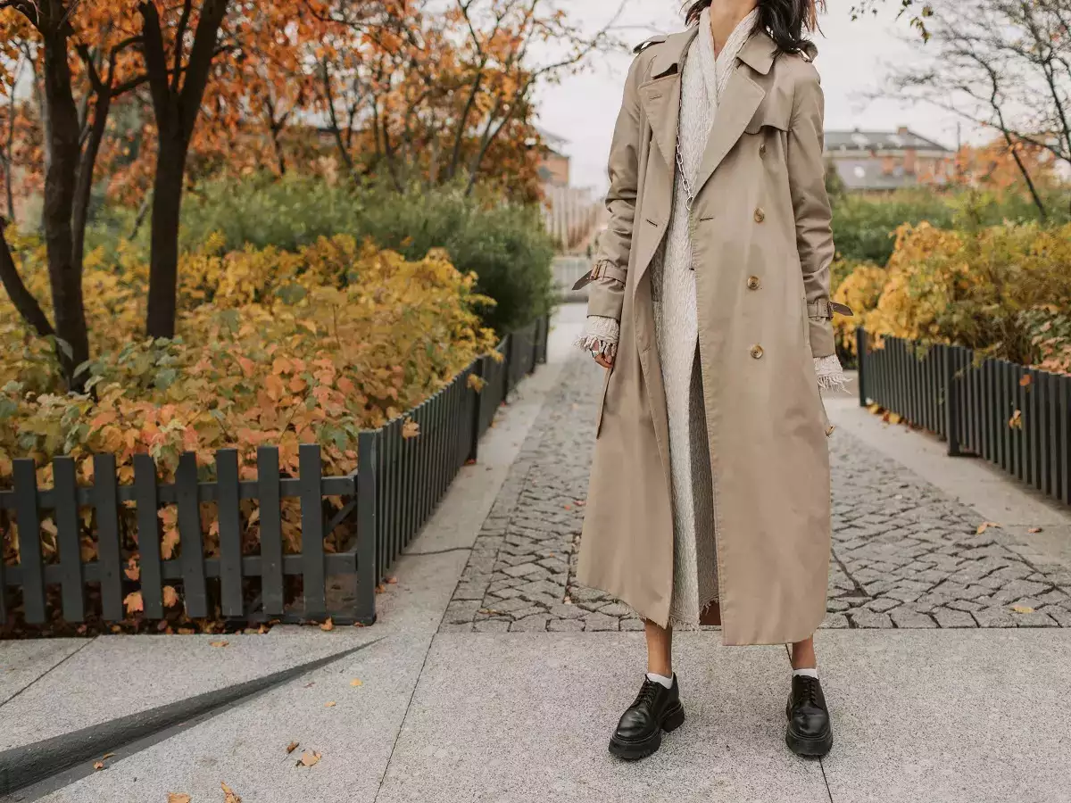 A girl wearing trench coat